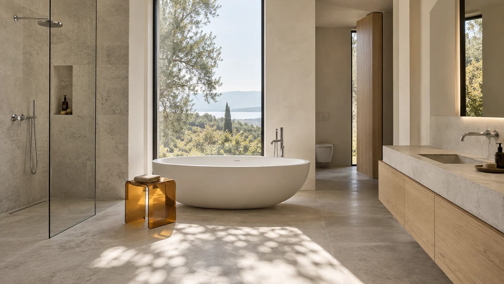 Bathroom concept with a sculptural white bath, limestone, oak and a translucent amber stool.